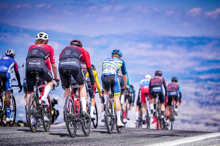 Dynamic road cycling race with competitive cyclists on scenic route in Mersin, Türkiye.